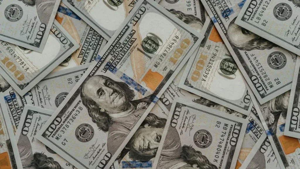 Close-up of scattered US dollar bills